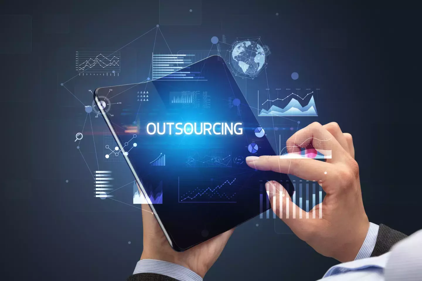 Man holding tablet with outsourcing concept